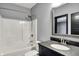 This bathroom has a new shower, granite countertop and white subway tile backsplash at 20451 Chatham Hills Blvd, Westfield, IN 46074