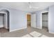 Cozy bedroom with neutral carpet, and multiple doorways leading to other areas of the home at 20451 Chatham Hills Blvd, Westfield, IN 46074