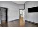 Spacious gray bedroom with closet, hardwood floors, and natural light at 20451 Chatham Hills Blvd, Westfield, IN 46074