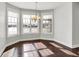 Dining room featuring hardwood floors and bay windows at 20451 Chatham Hills Blvd, Westfield, IN 46074