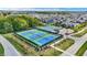 Overhead view of the community tennis courts, featuring well-maintained surfaces and scenic surroundings at 20451 Chatham Hills Blvd, Westfield, IN 46074