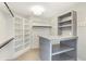 Walk-in closet featuring custom shelving and plenty of storage space at 20451 Chatham Hills Blvd, Westfield, IN 46074