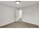 Bright bedroom with neutral carpet, a modern light fixture, and white walls at 2137 Napoleon St, Indianapolis, IN 46203