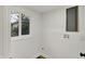Bright laundry room featuring fresh paint and a window to let in natural light at 2137 Napoleon St, Indianapolis, IN 46203