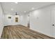 Open concept living area featuring modern flooring, and fresh paint at 2137 Napoleon St, Indianapolis, IN 46203
