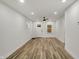 Open concept living area featuring modern flooring, and fresh paint at 2137 Napoleon St, Indianapolis, IN 46203