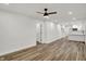 Spacious living room with open layout, new floors, connecting seamlessly to the kitchen with modern fixtures at 2137 Napoleon St, Indianapolis, IN 46203