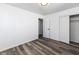 Bedroom with hardwood-style floors and a closet at 2306 Finley Ave, Indianapolis, IN 46203