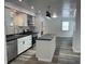 Modern kitchen with island, stainless steel appliances, and an open floor plan at 2306 Finley Ave, Indianapolis, IN 46203