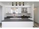Beautiful kitchen with stainless steel appliances, dark countertops, and decorative backsplash at 2306 Finley Ave, Indianapolis, IN 46203