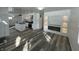 Bright, open-concept living room with fireplace and modern island kitchen at 2306 Finley Ave, Indianapolis, IN 46203