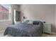 Bright bedroom with a window, closet, armoire, and night stand at 293 Carrick Glen Blvd, Pendleton, IN 46064