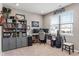 Comfortable bedroom setup with a window, shelves, decor, and neutral colored walls at 293 Carrick Glen Blvd, Pendleton, IN 46064