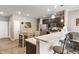 Bright kitchen featuring white countertops, stainless steel appliances, and an open layout at 293 Carrick Glen Blvd, Pendleton, IN 46064