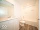 Clean bathroom featuring a vanity with a sink and a shower-tub combo at 3261 W Keepsake Ln, Monrovia, IN 46157