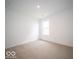 Bright bedroom with neutral carpet and ample natural light at 3261 W Keepsake Ln, Monrovia, IN 46157