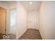 Bright entryway with wood-look flooring and white walls at 3261 W Keepsake Ln, Monrovia, IN 46157