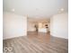 Open-concept living space with abundant natural light and hardwood floors throughout at 3261 W Keepsake Ln, Monrovia, IN 46157