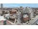 This aerial view showcases the building's urban landscape and architectural uniqueness at 333 Massachusetts Ave # 801, Indianapolis, IN 46204