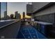 Enjoy outdoor entertainment on this deck with a shuffleboard and convenient outdoor kitchen at 333 Massachusetts Ave # 801, Indianapolis, IN 46204
