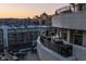 Multiple condo balconies featuring outdoor seating and stunning cityscape vistas, offering a luxurious urban lifestyle at 333 Massachusetts Ave # 801, Indianapolis, IN 46204