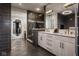 Contemporary bathroom with dual sinks, a glass-enclosed shower, and stylish tile work, offering a spa-like experience at 333 Massachusetts Ave # 801, Indianapolis, IN 46204