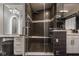 Elegant bathroom with a glass-enclosed shower featuring stylish tile work and a built-in bench at 333 Massachusetts Ave # 801, Indianapolis, IN 46204
