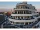 Unique condo architecture featuring multiple balconies with city views, offering luxurious urban living at 333 Massachusetts Ave # 801, Indianapolis, IN 46204