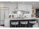 Open concept kitchen featuring marble countertops, stainless steel appliances, and pendant lighting at 333 Massachusetts Ave # 801, Indianapolis, IN 46204