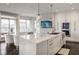 Spacious kitchen with marble island, stainless appliances, and open floor plan at 333 Massachusetts Ave # 801, Indianapolis, IN 46204