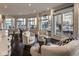 Stylish open-concept living area with contemporary furnishings and access to outdoor balcony with stunning city views at 333 Massachusetts Ave # 801, Indianapolis, IN 46204