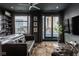 Sophisticated living room featuring a leather sofa, city views, and chic decor at 333 Massachusetts Ave # 801, Indianapolis, IN 46204