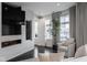 Inviting living room with built-in fireplace, city views, and comfortable seating, creating a cozy and stylish atmosphere at 333 Massachusetts Ave # 801, Indianapolis, IN 46204