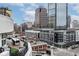 The rooftop patio features sleek outdoor dining, offering urban views and modern luxury at 333 Massachusetts Ave # 801, Indianapolis, IN 46204