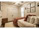 Cozy bedroom with window, ceiling fan, closet, and comfortable bed with decorative throw at 342 E Minnesota St, Indianapolis, IN 46225