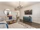 Bright living room with a cozy sectional sofa, patterned rug, and stylish decor at 342 E Minnesota St, Indianapolis, IN 46225