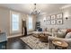 Comfortable living room with a large sectional sofa and stylish decor at 342 E Minnesota St, Indianapolis, IN 46225