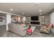 Finished basement with a comfortable seating area, fireplace, and entertainment center at 3982 Abbotsford Dr, Westfield, IN 46074
