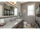 Bathroom with granite countertops, a dark wood vanity, and neutral walls at 3982 Abbotsford Dr, Westfield, IN 46074