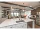 Bright kitchen with island, stainless appliances, and open to living room, perfect for entertaining at 3982 Abbotsford Dr, Westfield, IN 46074