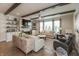 Inviting living room with stylish furnishings, fireplace, built-in shelves, and natural light at 3982 Abbotsford Dr, Westfield, IN 46074