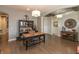 Spacious living room featuring wood floors, a desk, black hutch and a view of the entryway at 3982 Abbotsford Dr, Westfield, IN 46074