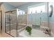 Bright main bathroom with a separate glass shower and soaking tub at 3982 Abbotsford Dr, Westfield, IN 46074
