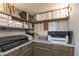 Well-organized office space with built-in shelves, cabinets, and ample storage for books and office supplies at 3982 Abbotsford Dr, Westfield, IN 46074