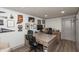 Finished basement office featuring a large desk and decor with a basketball hoop on the door at 3982 Abbotsford Dr, Westfield, IN 46074