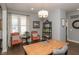 Bright home office featuring a large desk, cozy seating, and a window with natural light at 3982 Abbotsford Dr, Westfield, IN 46074
