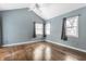 Bedroom with hardwood floors, vaulted ceiling, natural light and neutral walls at 5937 Broadway St, Indianapolis, IN 46220