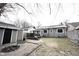 Backyard features a fire pit, shed, deck and patio at 6047 Guilford Ave, Indianapolis, IN 46220