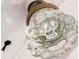 Close up of an antique glass door knob at 6047 Guilford Ave, Indianapolis, IN 46220