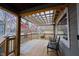 Inviting porch with seating and pergola, perfect for enjoying the outdoors at 6047 Guilford Ave, Indianapolis, IN 46220